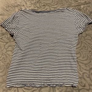 Blue and white striped shirt, stretchy material, size small. No stains or rips